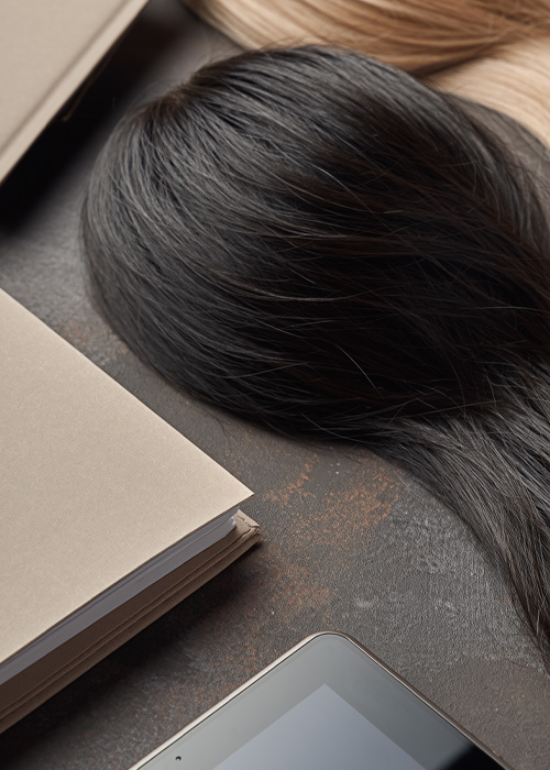 Symbolische Darstellung zu Hilfsmittelzuschüssen im Avenoso Perücken Studio